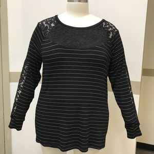 Black stripped top with lace design.